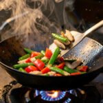 Why Carbon Steel Woks Beat Non-Stick for Stir-Fry Crisp Now